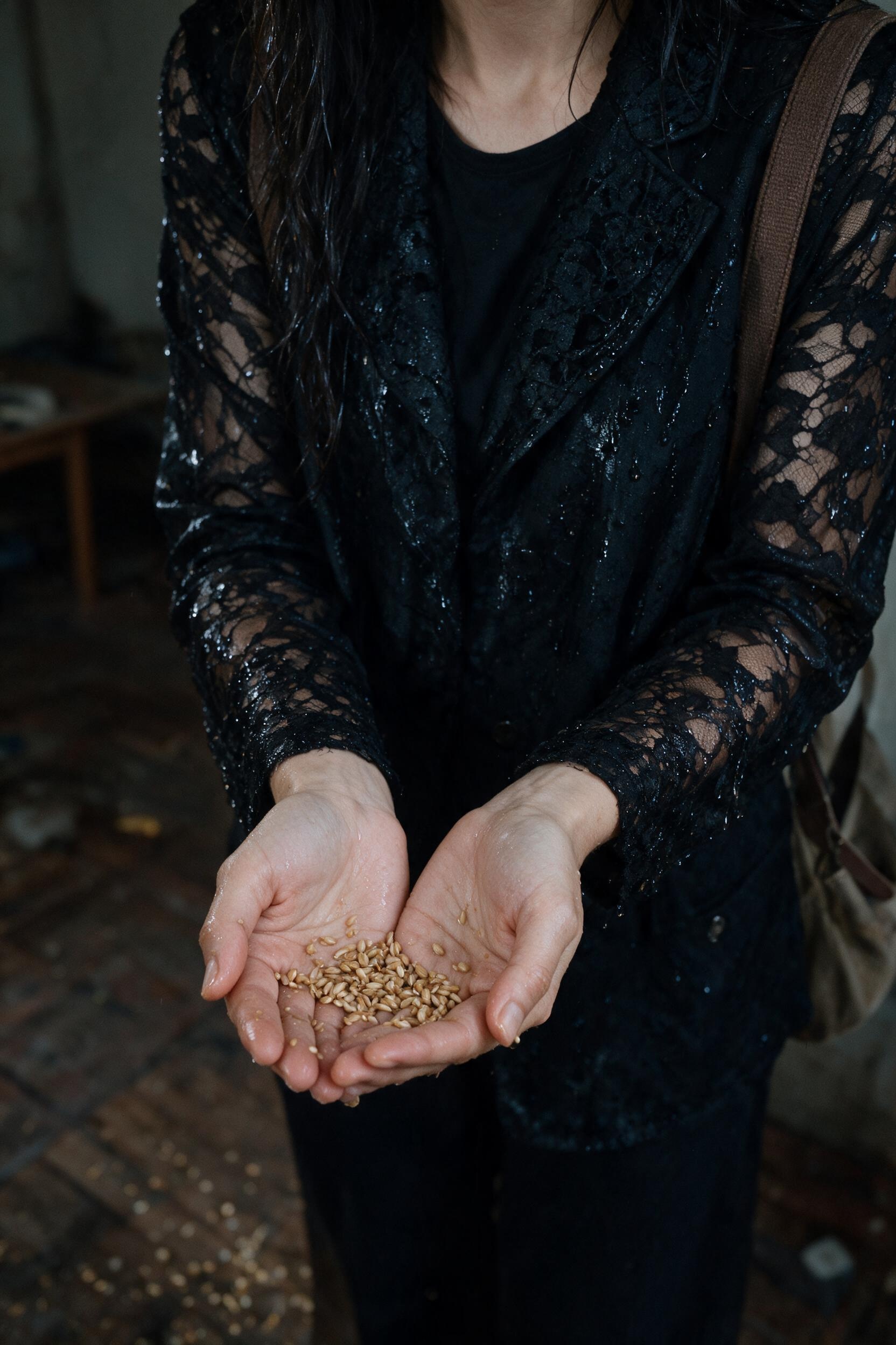 A sweat-soaked black top, a slipped strap, caught on the stairwell landing.