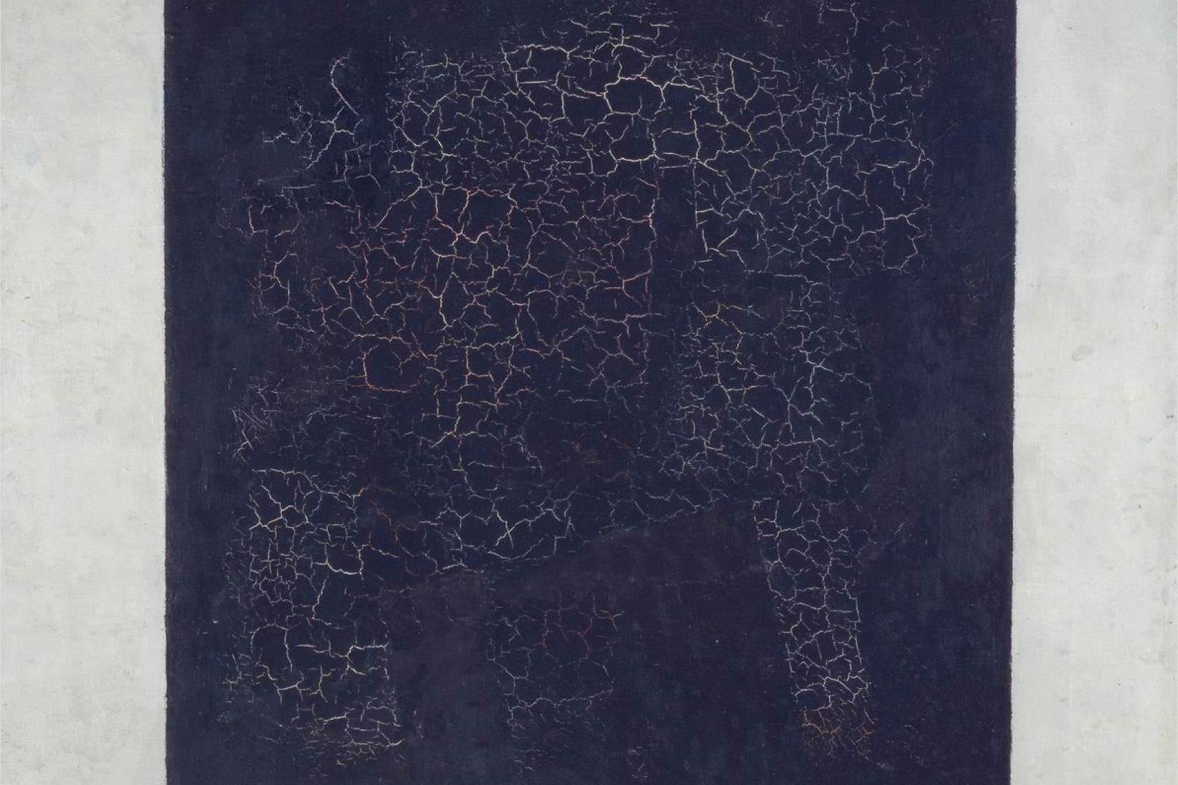 Kazimir Malevich's Black Square of 1915: a black square on a white ground, the paint cracked with age.