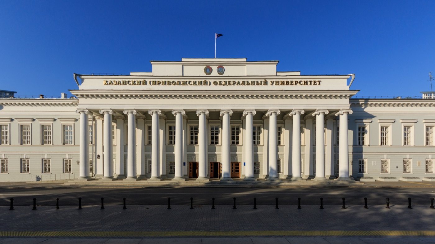 The white colonnaded main building of Kazan University in sunlight.