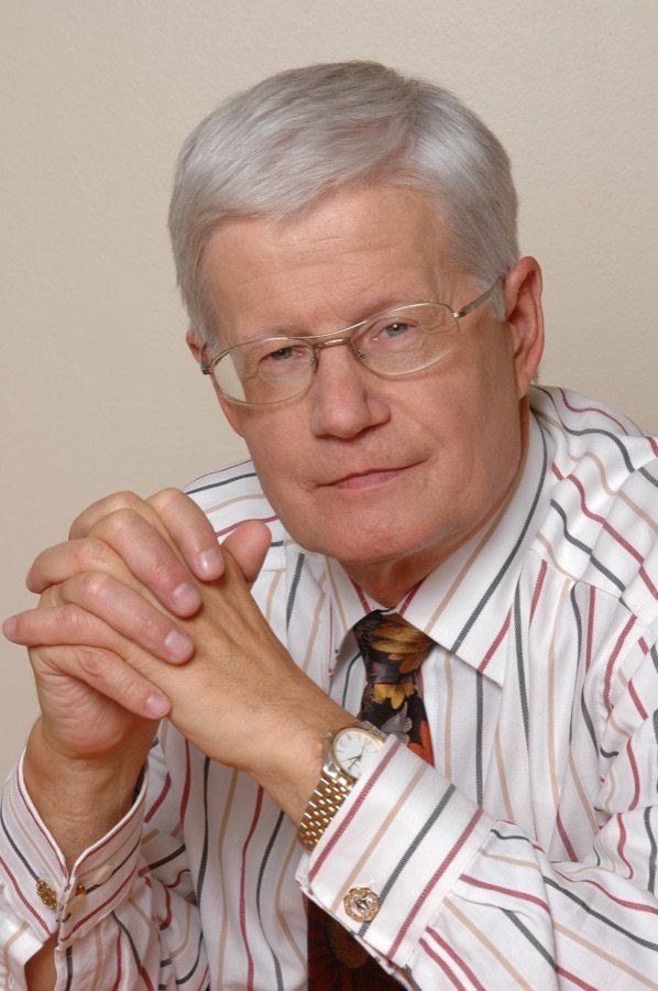 Portrait of Alexander Tarkaev in a suit, 2004.